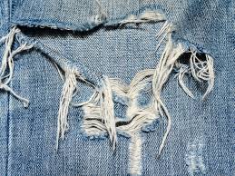 Guys, you only need a scissor and a pin/needle to do it. The Best Way To Fix Your Ripped Jeans Gq