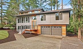 The split level is an original home style that represents a significant time in the history of north american housing, the postwar building boom. Mid Century Modern Split Level Floor Plans House Plans 97591