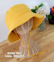 หมวกบ กเก ตแบบส สาย ส เหล องจำปา ใบละ 260บาท รวมป กไม จำก ดต วอ กษรค ะ รอบหมวก 23 24น วค ะ สายยาว 40เซนค ะ หมวกเปล า ใบละ 190บาท หมวกป ก หมวก สไตล สาวน อย