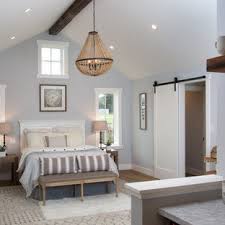 This room doesn't get the best natural light, but the whole space feels brighter now with the light color scheme. 75 Beautiful Farmhouse Bedroom With Blue Walls Pictures Ideas July 2021 Houzz