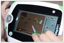 A settings dialog box appears in the center of the screen. 3 Garnets 2 Sapphires Leapfrog Leappad Explorer