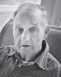 Rites held for Paul Mullins