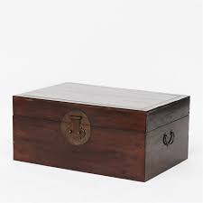 A marble coffee table will be a grand focal point. Blanket Chest Fitted With Round Brass Medallion Hardware Coffee Table