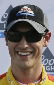 Logano wins pole at Michigan