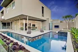 White House Accommodating An L Shaped Alfresco Pool In Caulfield North By Serenity Pools Modern Pools Lap Pools Backyard Lap Pool Designs