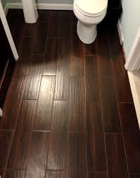 Once the sealant is completely dry, apply glue to the back of the tile along the raised lines and press felt square if you don't have extra tiles, you can always use wood. Tile That Looks Like Wood Wood Look Tile Flooring Home Diy
