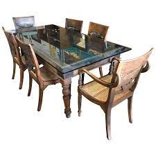 If you have the space, a china hutch, buffet or server can also help to complete your dining room. Tibetan Temple Door Dining Room Table Design Plus Gallery