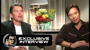 Lee byung hun shows off a brand new side of him as a western cowboy in the upcoming hollywood movie magnificent seven. on august 1, universal pictures released new stills of lee byung hun as bill rocks, an assassin who shows expertise with knives and close combat. Ethan Hawke Byung Hun Lee Exclusive The Magnificent Seven Interview Joblo Com Youtube