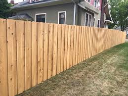 We believe our cedar fences stand out white cedar weathers to a beautiful silvery gray and is a stable, strong wood. Fence Installation Appleton Post Hole Drilling Wood Fences Custom Fence Appleton Green Bay Oshkosh