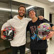 Car gifts for fans and enthusiasts. Daniel Ricciardo And Motogp Rider Fabio Quartararo Swapping Helmets Formula1