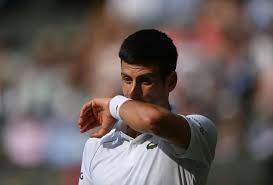 Serbia's novak djokovic poses with the trophy in front of the eiffel tower on june 14, 2021 in paris, one day after winning the roland garros 2021 french open tennis tournament. Am56i7hb2t5xcm