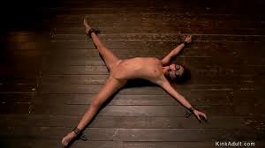 Gagged little brunette Asian slut in wooden bdsm throne gets pussy rubbed -  XNXX.COM