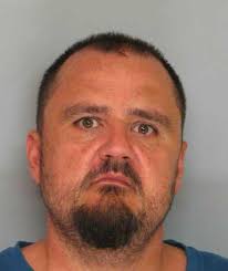 Authorities: Man charged with assaulting woman with brass knuckles