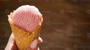 Close up image of woman hand holding raspberry ice cream 3259992 Stock  Photo at Vecteezy