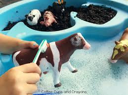 What types of animals are on the farm? Washing Farm Animal Sensory Bin Coffee Cups And Crayons