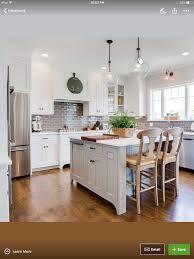 The Cabinets Are Extra White The Island Is Dovetail The Walls Are Agreeable Gray White Kitchen Interior Design White Kitchen Interior White Kitchen Design
