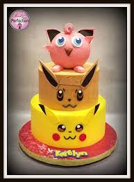 Two Tiered Pokemon Theme Cake With Pikachu And Eevee As The Cake Layers With Jigglypuff Custom Topper Made From Pokemon Birthday Cake Pokemon Cake Pikachu Cake