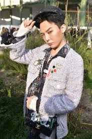 He worked as a trainee for 6 years for the south korean record label company, yg entertainment, where he used to clean the studio for the performing artists and fetch water bottles for them during the initial period. G Dragon In The Front Row Jamie Dornan Gu Family Books G Dragon