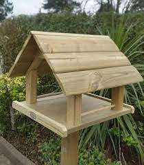 Resultado De Imagem Para Bird Tables With Slate Roof Popularwoodworkingplywood Wooden Bird Feeders Bird Houses Diy Wood Bird Feeder