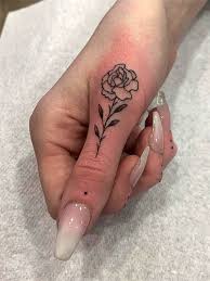 Flower tattoo designs are a popular pick for their symbolism. 30 Simple And Small Finger Tattoos That You Ll Want To Copy Flymeso Blog