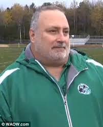 Incredible moment boy, eight, with Down syndrome scores a touchdown in high  school team's last play of the season