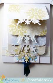 Score a piece of 12x12in cardstock at 4in and 8in on both sides so you'll have nine 4x4in squares. Snowflake Waterfall Card Explosion Box Pazzles Craft Room