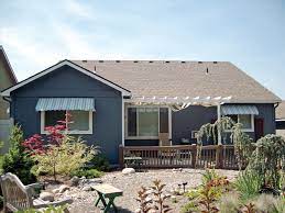 Shown On This Desert Home In Arizona Are Nuimage Awnings Series 3700 Fabric Window Awnings With Sunbrella S Desert Homes Craftsman Living Room Fabric Awning