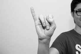 In most asian cultures, two or more people pointing a pinkie finger at each other is a gesture to make a promise (in the end where you join. Japanese Body Language Guide