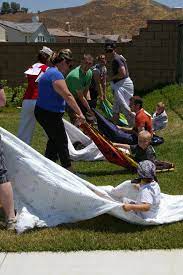 27 Fun Outdoor Games You Ll Want To Play All Summer Long Fun Outdoor Games Outdoor Games Family Reunion Games