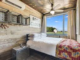 Flophouze shipping container hotel has an outdoor pool. Flophouze Shipping Container Hotel