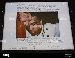 Fans and mourners left artwork at the BB&T Center for the memorial service  in honor of slain rapper, XXX Tentacion, in Sunrise, Fla., on Wednesday,  June 27, 2018. (Photo by Daniel A.