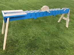 La Meule Or The Grinder Wheel Fun Game For All Ages 8 Long Wheel Is 12 Dia Dowel Is 1 1 8 Dia Made From 2 X8 Lumber G Fun Games Outdoor Games Lumber
