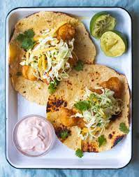 I served these for dinner last night with some guacamole on the side (not pictured here) and my husband was a very happy man. Baja Style Tempura Fish Tacos With Mango Cabbage Slaw Amanda Frederickson