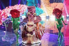 The season five finale of the masked singer aired wednesday night, and singer nick lachey was revealed as the winner behind the piglet mask. The Masked Singer Season 5 Reveals First Contestant And The Snail Is