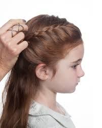 On one hand, it's so easy for even a hairstyling novice to do and it works for every occasion. Flower Girl S Braided Half Up Half Down Hairstyle Martha Stewart
