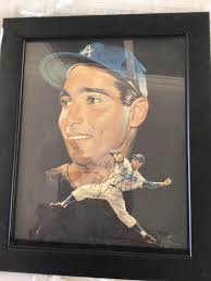 In 1958 my dad took me to Campbell's Dept store in Santa Monica to meet 3  players and get this baseball signed by Carl Furillo, Joe Pignatano and  Sandy Koufax.