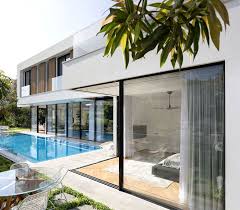 L Shaped House Completely Open To The Pool L Shaped House Modern House Exterior Modern House Design