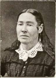 This is Nancy Gwyn... Legend says that she was a Cherokee woman. She is  standing in front of her house