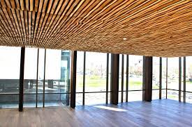 Interior wood ceilings | wood ceilings solution the hunter douglas range of interior wood ceilings offers an unrivalled range of wood finishes and natural tones that will produce a breath taking finish to. Wavy Wood Ceilings Nach Spring Valley Archello