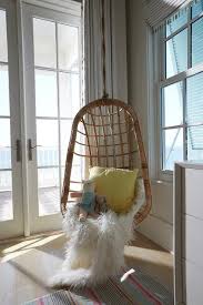 Hanging chairs are the new, cool thing that can be suspended from a sturdy branch in your garden this indoor hanging ball chair is better without a stand. Corner Hanging Rattan Chair Design Ideas