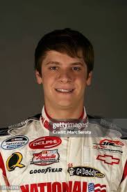 Joey Clanton, driver of the Zaxby's Ford, poses at Daytona... News Photo
