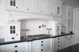 This kitchen is a perfect example of one that doesn't fall into a style mold. 10 Rules To Create The Perfect White Kitchen Over The Big Moon