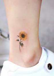 Celebrate The Beauty Of Nature With These Inspirational Sunflower Tattoos In 2020 Tattoos Dainty Tattoos Sunflower Tattoos