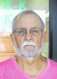 Students get book bags, supplies at distribution event to honor deceased  teacher