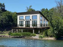 Hpm Home Plans Home Plan 763 751 In 2021 Vacation House Plans Modern Style House Plans Cabin House Plans