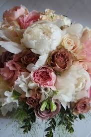 Beaded lace follows the drape. The Flower Magician Vintage Pink Wedding Bouquet Wedding Bouquets Pink Vintage Bouquet Wedding Flower Arrangements
