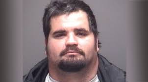 Police: Man beaten, left naked in ditch after incident involving woman, dog 