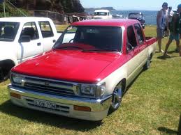 Red And Cream Toyota Hilux Minitruck Toyota Hilux Lowrider Cars Toyota