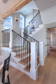 Modern farmhouse design has become extremely popular in new. Iron Stair Rails With White Oak Wood Floors And Overhead Beams Create A Drool Worthy Staircase Dream House Modern Farmhouse Staircase House Design