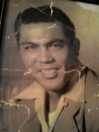 Ben Aguon receives Father of the Year Award from the Navy along with his  wife Rosalina Duenas Aguon and their 12 children including my recent wife  Julia Duenas Roth. Circa 1956